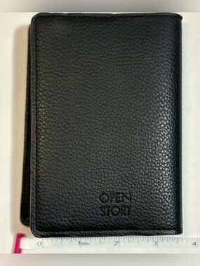 Open Story black pebble leather passport holder or travel wallet